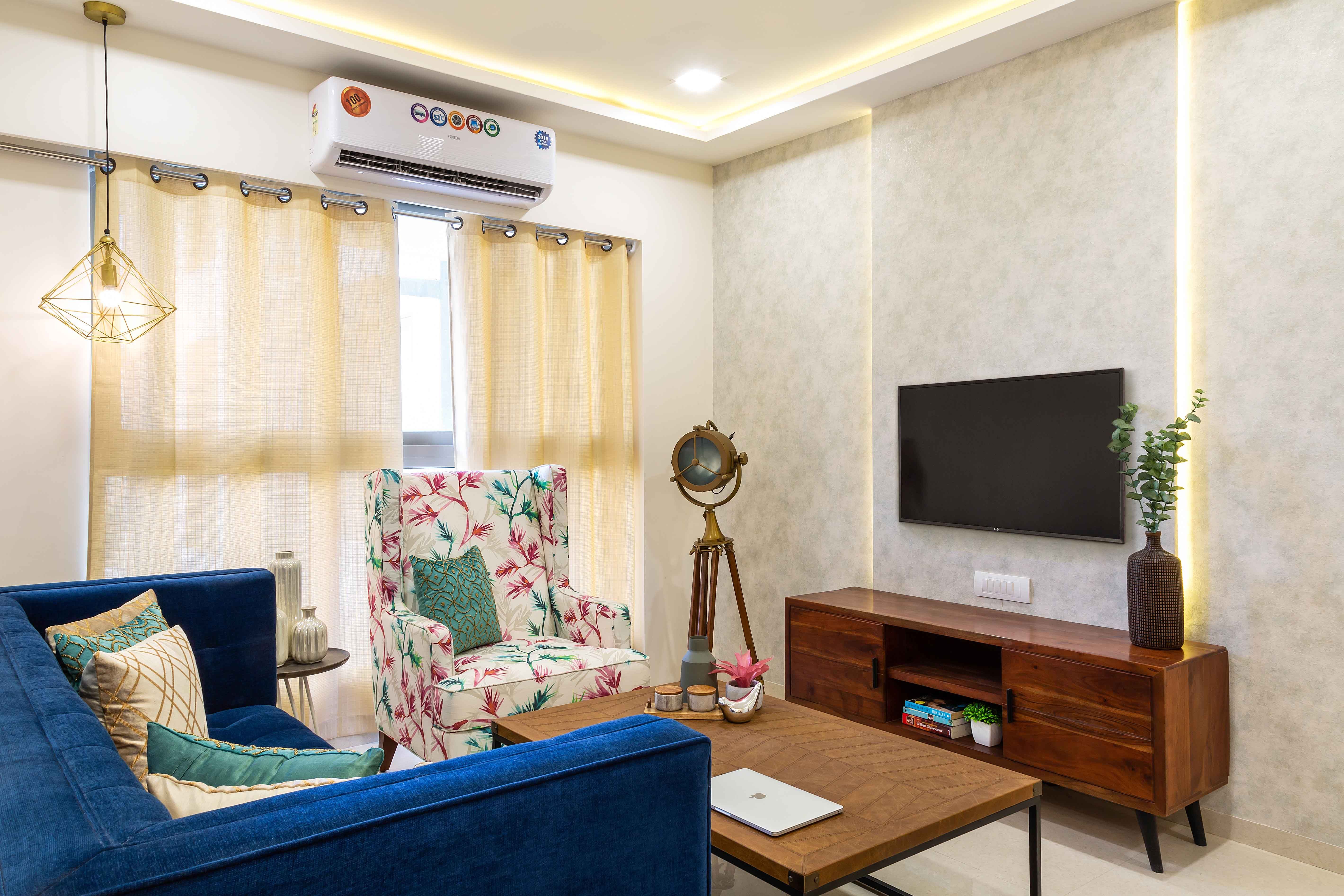 Modern 2-BHK Flat In Mumbai With Blue Seater And Accent Chair