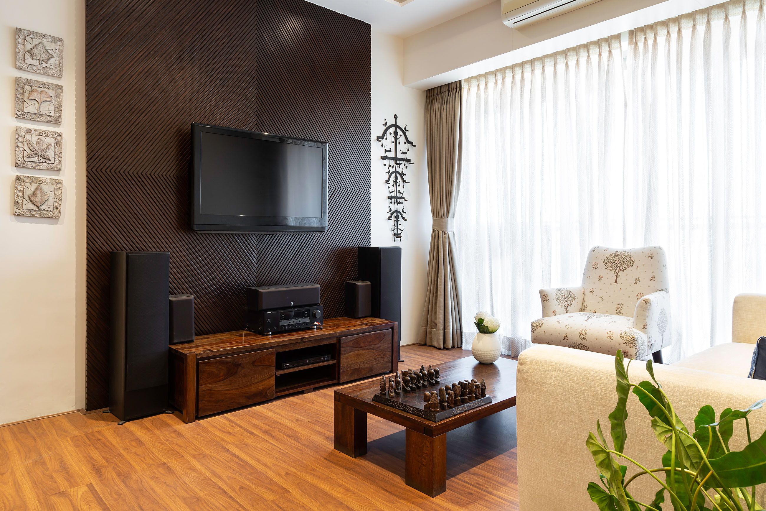 Modern 2-BHK Flat In Mumbai With Wooden Fluted TV Unit Design