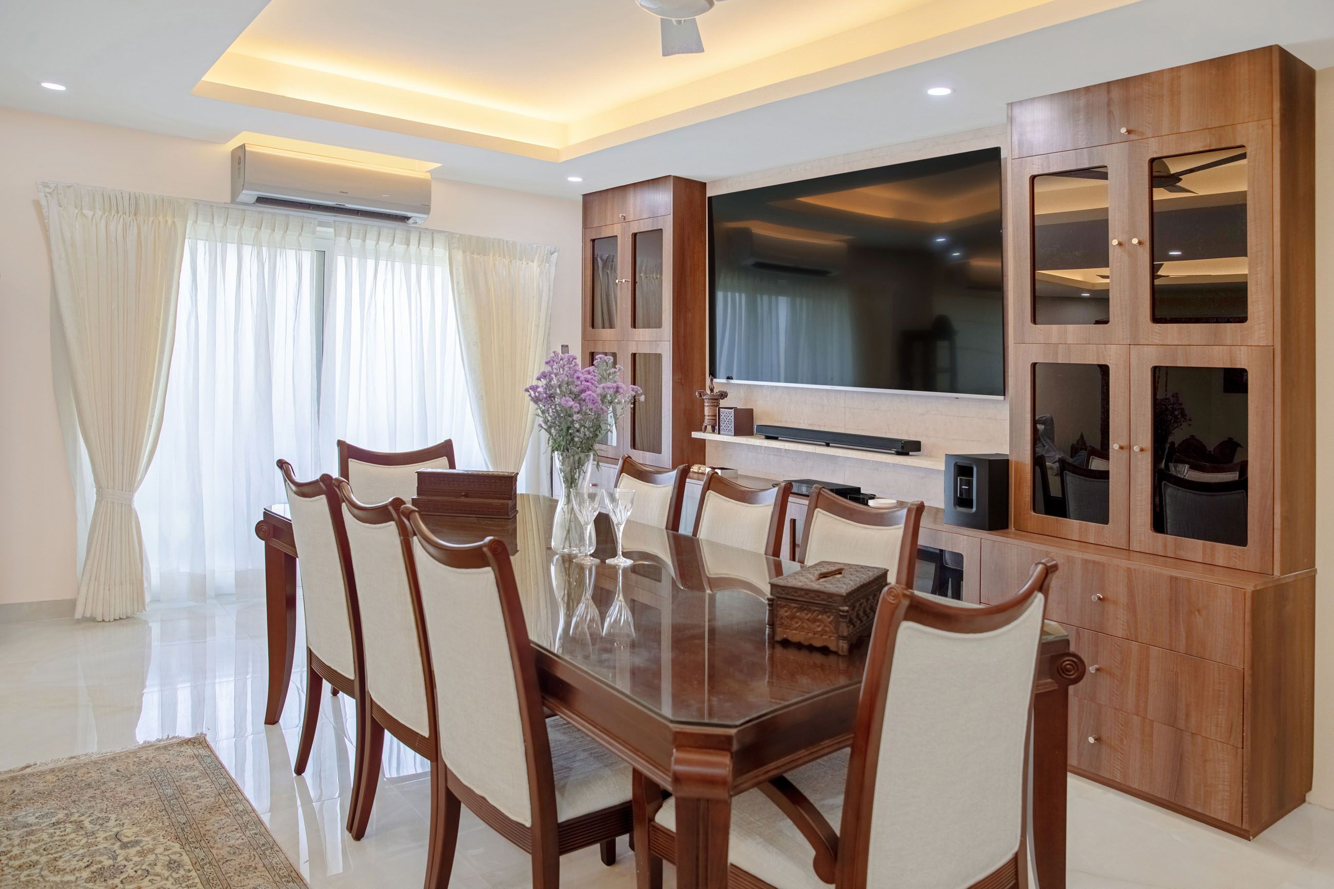 Contemporary Dining Room Design With A Wooden Crockery Unit