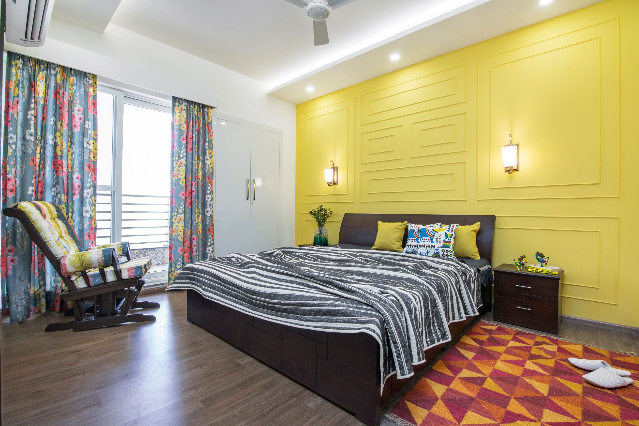 Modern Guest Room Design With Yellow Wall Paint And Trims