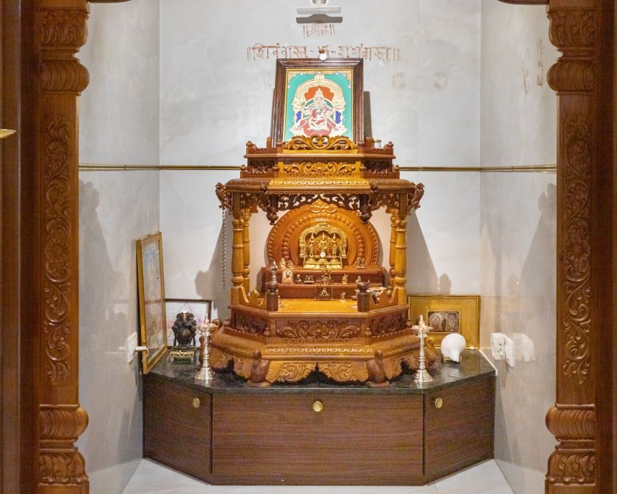 Traditional Pooja Mandir Design With A Marble Countertop